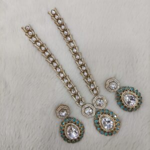 White Stones Pendant Set Highlighted With Light Blue Stones With Matching Ear Rings